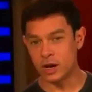 The same man's face, cut out and enlarged.